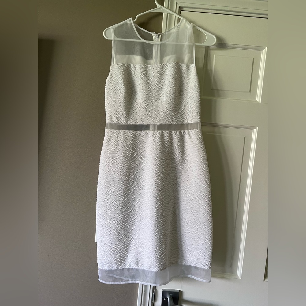 Calvin Klein white dress with sheet cutouts. Worn once for bridal shower